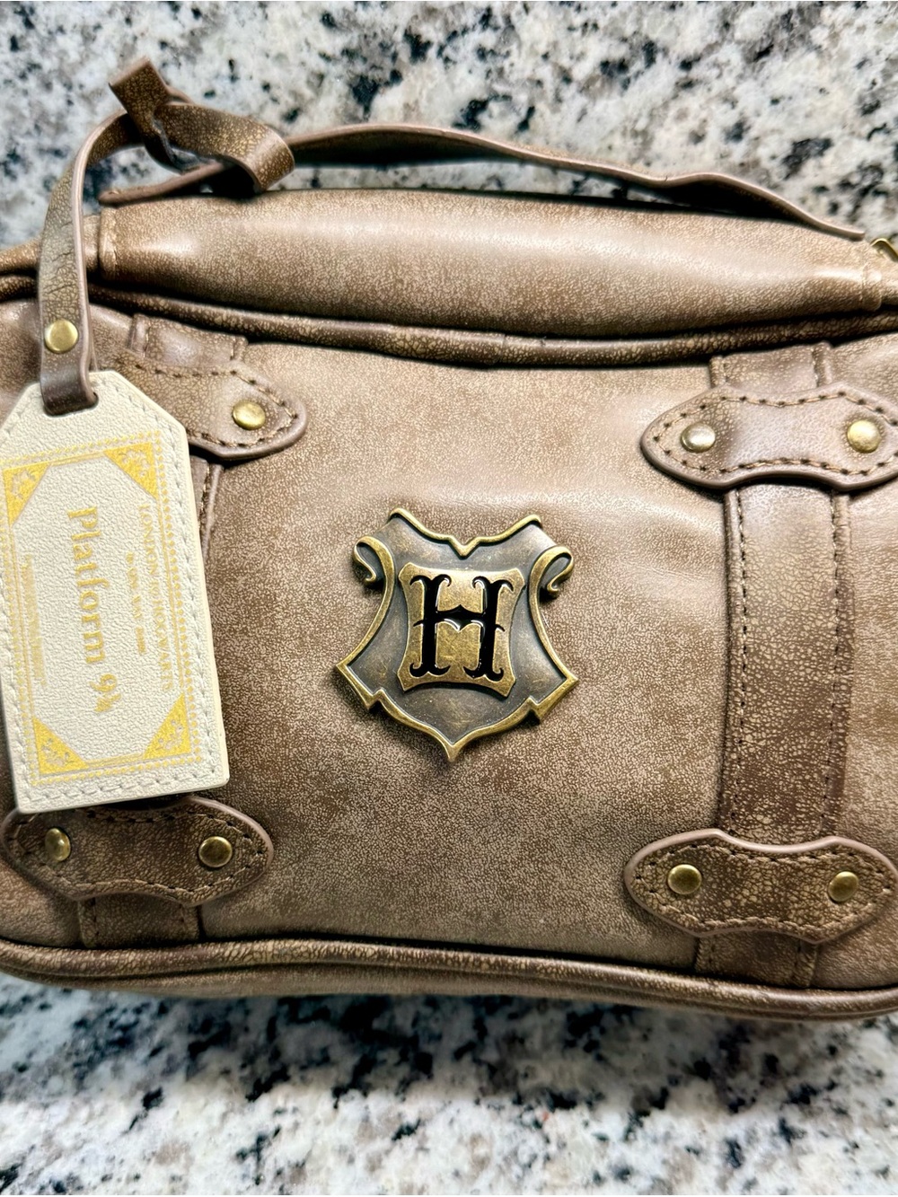 Wizard World Harry Potter Metallic Bronze Handbag with Crest Emblem cosmetic bag